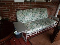 Cute vintage metal glider with cushions