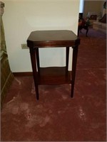 Brown wood side table approx 28 inches tall