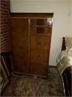 Waterfall pattern armoire with 4 drawers and a