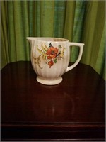 Ivory porcelain pitcher with fall floral design