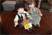 Pair of Porcelain Dolls with wooden bench