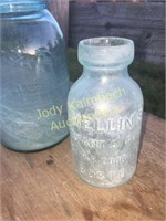 Embossed Mellins infant formula bottle