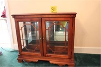 display case with glass shelves;