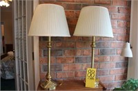 two brass  banquet lamps