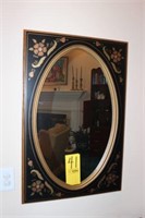 framed oval mirror