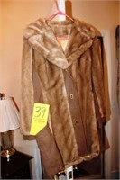 Lady's fur and leather coat