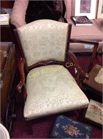 UPHOLSTERED VINTAGE CHAIR W/HAND CARVED KNUCKLE