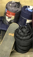 Lot with: 4 skate boards, 4 sleeping bags   (k 85)