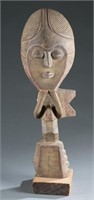 Abstracted wood African style female figure.