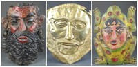 3 Mexican metal masks, 20th century.