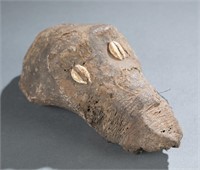 West African mud and textile monkey skull.