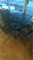 Outside patio metal table with 4 chairs