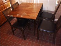 Lot #89 Breakfast table and four folding cane