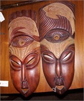 Lot #59 Pair of carved tribal masks 20”