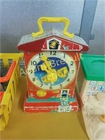 Vintage Fisher Price music box teaching clock
