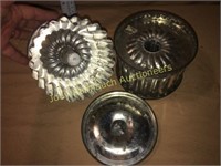 Pair of fluted tin Steamed pudding molds