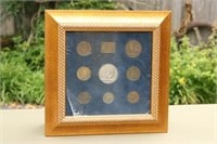 Framed bronze and silver yachting medals