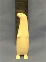 4" carved ivory otter with inset baleen eyes