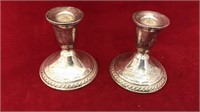 pair of sterling silver candlestick holders