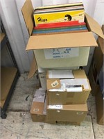 Seven boxes of old record albums        (k 90)