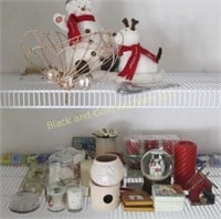 Linen closet shelves of decorative items
