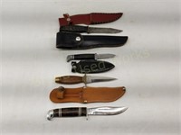 Lot of 4 Fishing/Hunting knives and leather sheath