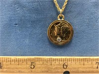 A gold plated Mercury dime on chain        (3)