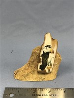 3" scrimshaw of a puffin done on fossilized ivory