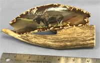 Moose painting on an agate slab with an antler bas
