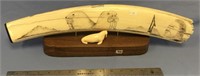 Scrimshawed walrus tusk of a hunter, tusk: 20" mou