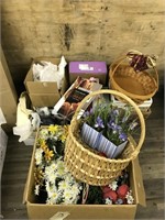 Assortment of baskets, fake flowers, and decorativ