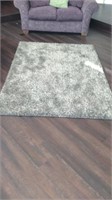 2 brown and gray rugs 
Excellent condition