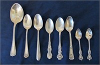 8 unmatched silver spoons
