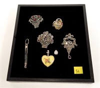 Floral pins and pendants, some sterling