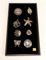 Lot, sterling silver pins and pendants