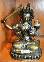 Old cast bronze seated Asian Buddha