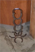 Stand Made of Metal Horseshoes