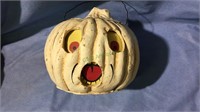 Halloween pumpkin with cut out eyes & mouth, by