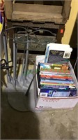 Box of kids DVD movies, and 4 metal doll stands,