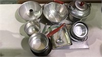 Group of children's kitchen pots and pans,