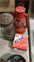 Two small oil lamps, 1 new & 1 old with a box of