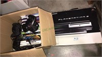 Sony PlayStation 3 game console, Box full of Xbox