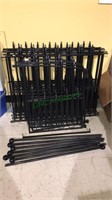 Metal fence set up, includes 43 foot sections, 24