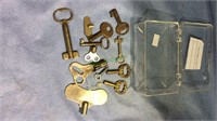 4 clock keys, skate key and some furniture keys,