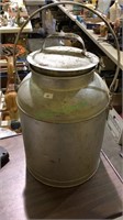 Old metal milk can with handle, (684)
