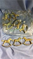 Set of 8 solid brass rocking horses, 3 inches