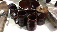 Four pieces of brown glaze redware pottery, bowl