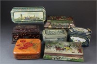 A group of 7 biscuit tins