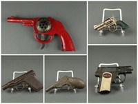 Group of toy pistols, including Dick Tracey Siren