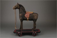 Burlap, Leather and Wood Toy Horse with Wheels.